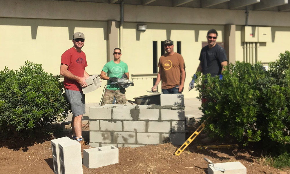 Volunteers building Green Elementary's spirit wall